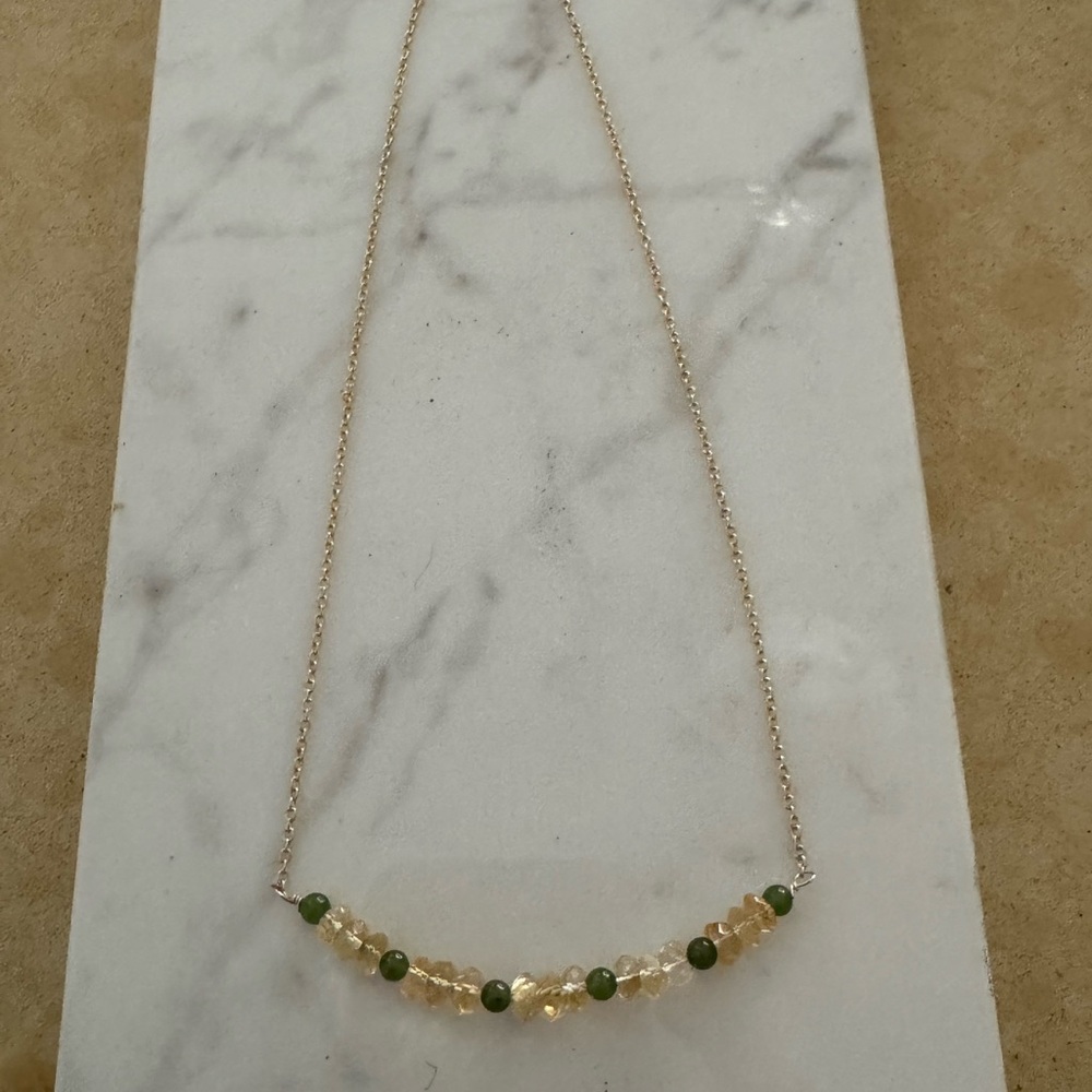Gold necklace with citrine and jade beads